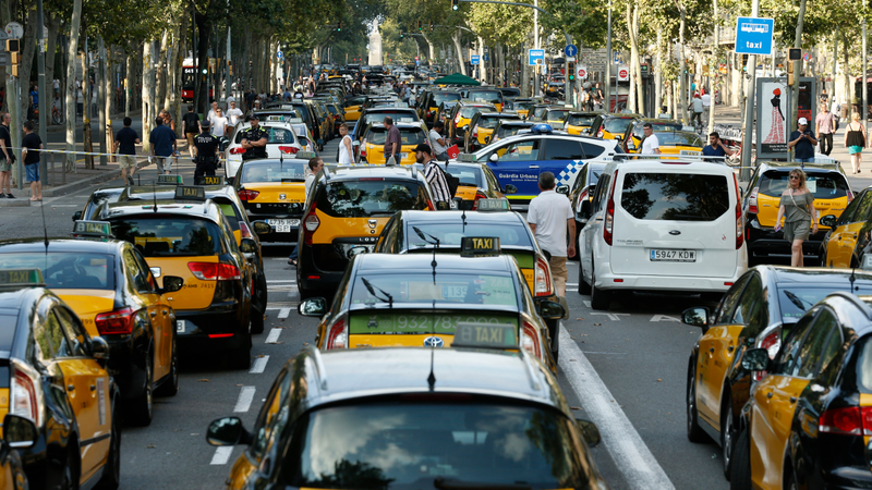 Taxi drivers block the Gran Via avenue in Barcelona